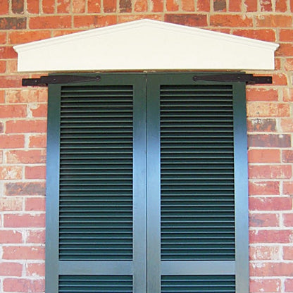 Closeup of Heavy Duty Brick Mount Pintel with black powder coating installed on closed black shutters.
