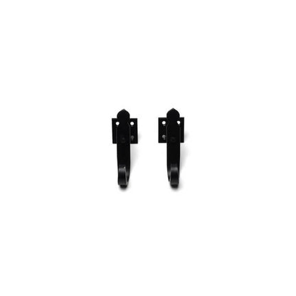 Closeup of Plate Mount Rat Tail Shutter Tiebacks with black powder coating.