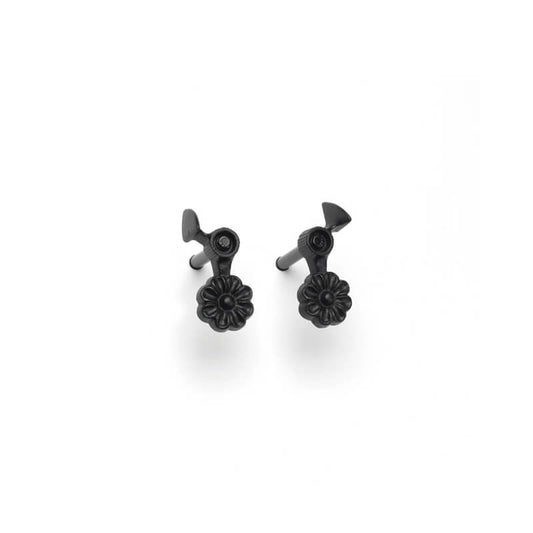 Closeup of Lag Mount Flower Shutter Tiebacks with black powder coating.