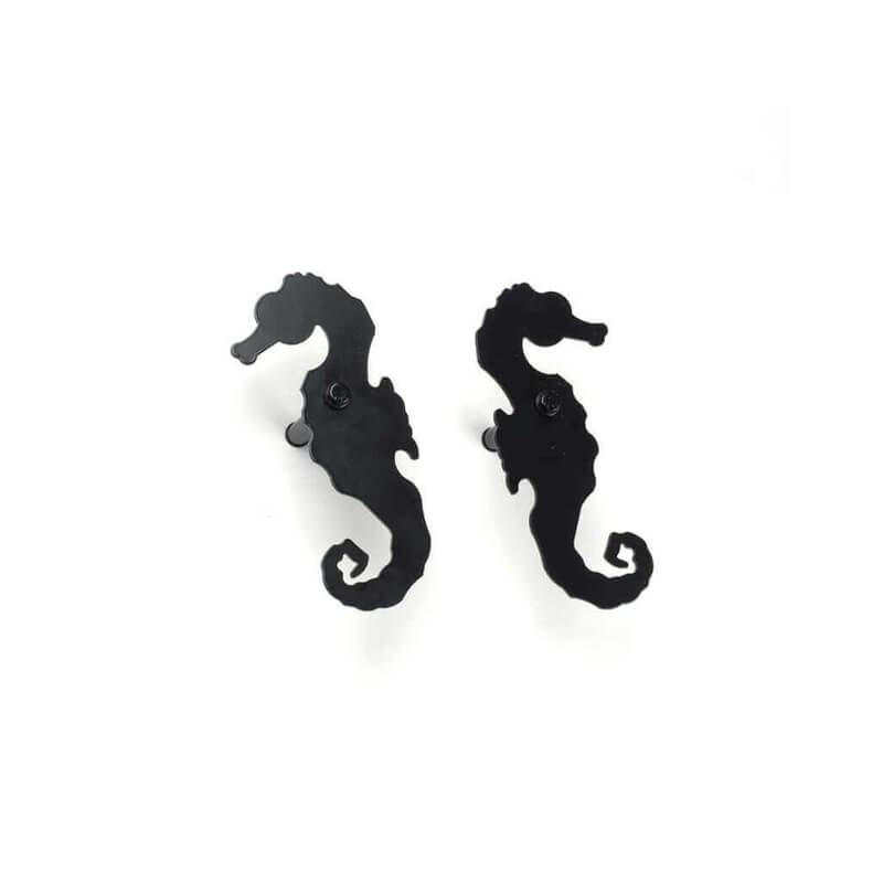 Closeup of Plate Mount Sea Horse Shutter Tiebacks with black powder coating.