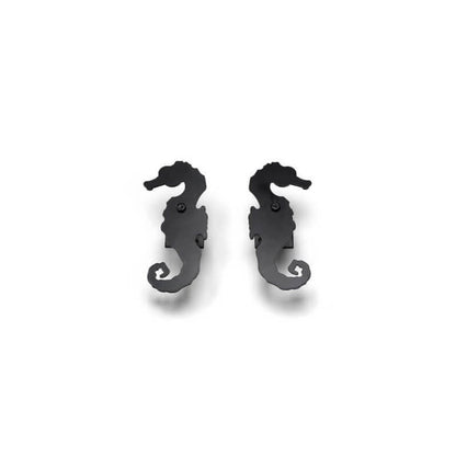 Closeup of Plate Mount Sea Horse Shutter Tiebacks with black powder coating.